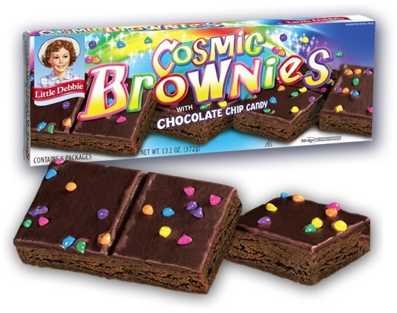 A box of little Debbie cosmic brownies with one and a half brownies open in front of the box
