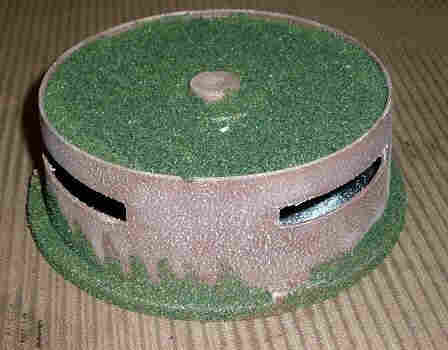 Pill-box bunker made from old CD Case
green roof with brown walls
