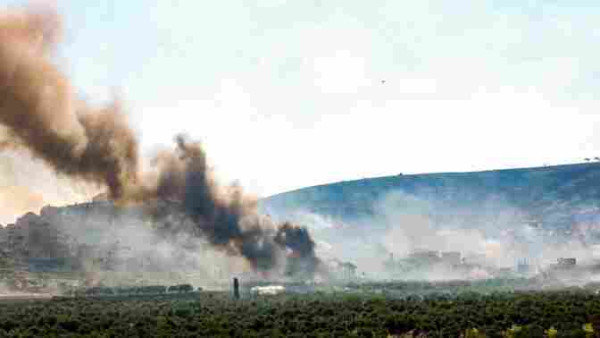 Smoke rises from the village of Duma after settlers set fire to cars and houses, 13.4.24 (photo: Itai Ron)
