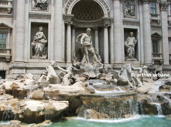 View of the Trevi fountain on a sunny day. The capture only includes the fountain itself.