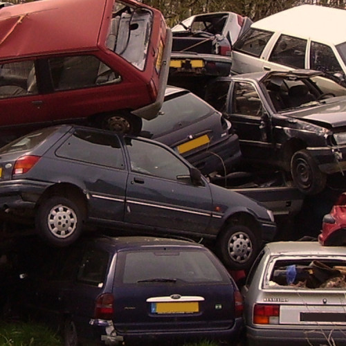 
Image:
Cjp24
https://commons.wikimedia.org/wiki/File:Automobiles_in_a_french_junkyard.jpg

CC BY-SA 3.0
https://creativecommons.org/licenses/by-sa/3.0/deed.en
