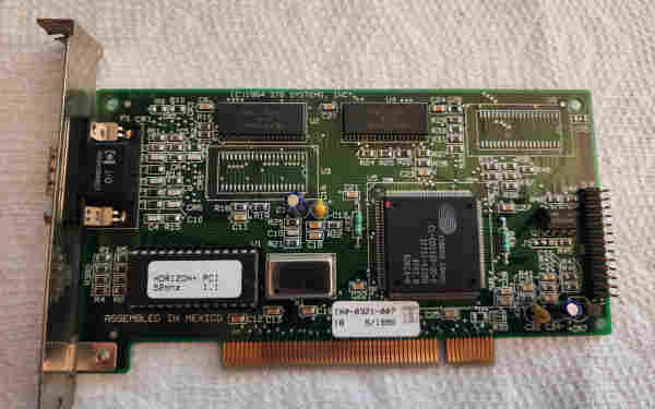 A PCI video card, with two RAM chips and two unpopulated RAM pads