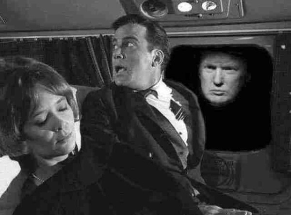 Scene from The Twilight Zone "Nightmare at 20,000 Feet" episode where William Shatner's character, with his character's wife sleeping next to him, tries to get stewardist's attention concerning creature on the wing of the plane. Face of the creature staring in plane window has been replaced by the face of something much more evil...Donald Trump.