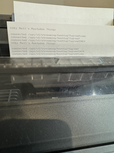 Photo of A4 paper sheet in dot matrix printer, with text reading
Matt's Mastodon Thingy
Connected