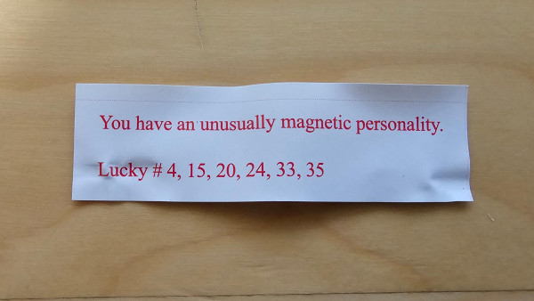 A fortune cookie slip that says, "You have an unusually magnetic personality." 