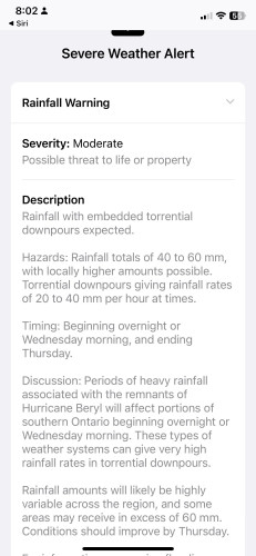 Severe Weather Alert screen with a Rainfall Warning. Severity: Moderate, indicating a possible threat to life or property. Description: Torrential downpours expected with rainfall totals of 40 to 60 mm and possible higher amounts. 