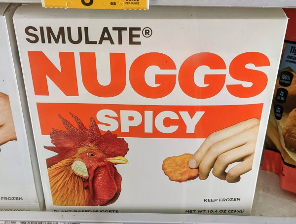 Simulate nuggs spicy box with a hand offering a nugg to a cock.