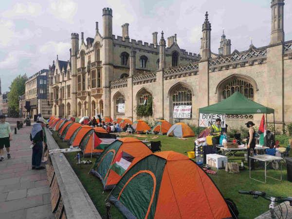 20 or so tents camping in Cambridge in front of King's College for peace in Gaza. They weren't there yesterday. 