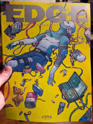 Cover of Edge Magazine #396 may 2024 featuring Citizen Sleeper 2. A human figure floats in space. They have implants and connecting cables in a cyberpunk fashion. A lot of space tech floats around them.