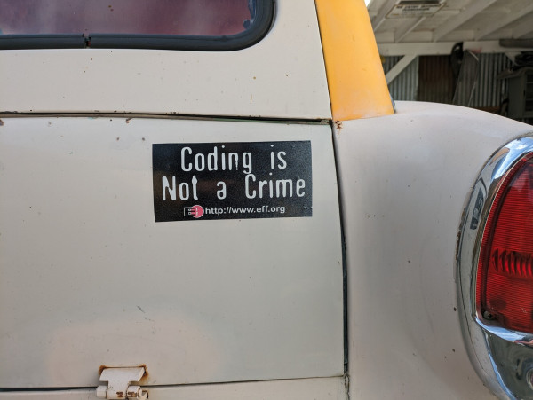sticker on the rear of my rambler station wagon that reads

CODING IS NOT A CRIME

EFF.ORG