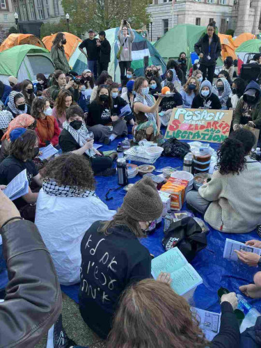 A photo of a Passover seder at a protest encampment at Yale.