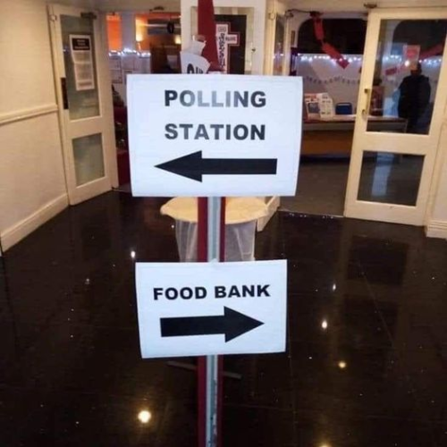 A photo capturing the zeitgeist of the times, showing two signs on a post. One points left and says, "Polliing station" the other points left and says "Food Bank"