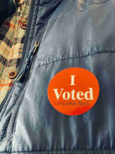 My  “I Voted” sticker with “uncommitted” written on it 