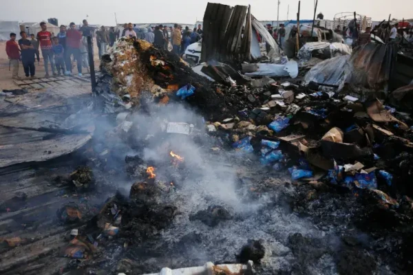 The aftermath of a deadly Israeli attack on an encampment in Rafah in May [File: Ashraf Amra/Anadolu]