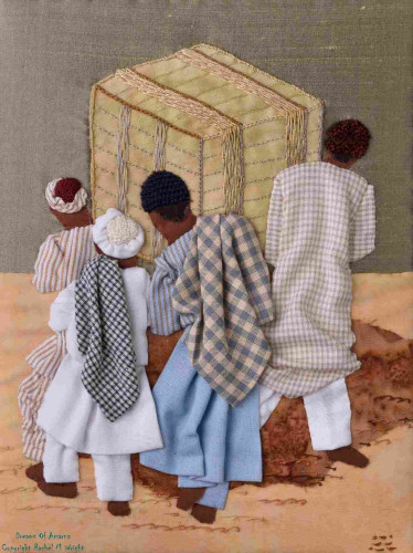 Picture in fabric applique showing four workmen manhandling a large crate.