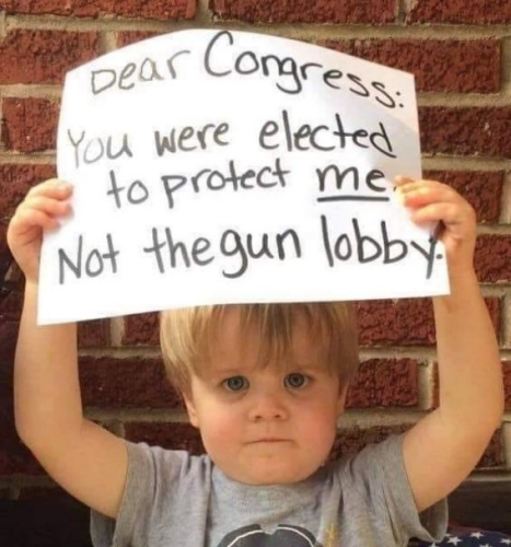 Photo of young boy, holding sign that reads, 'Dear Congress, You were elected to protect me, not the gun lobby'