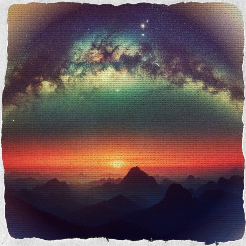 Edited AI image of a landscape, dark mountains, a glowing sun, galaxy skies... 