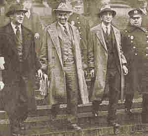 Unemployed Councils activists William Z. Foster, Robert Minor, and Israel Amter at the time of their March 1930 International Unemployment Day arrests in New York City. By Uncredited photo. - Photo published in Labor Defender, vol. 5, no. 4 (April 1930), pg. 64.Digitized and additional digital editing by Tim Davenport (&quot;Carrite&quot;) for Wikipedia, no copyright claimed., PD-US, https://en.wikipedia.org/w/index.php?curid=35289258