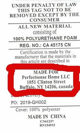 A label from a pillow. It has information on it, including the address of the company. It is:
PerfectSense Home LLC
1051 Clinton Street
Buffalo, NY 14206, Canada
