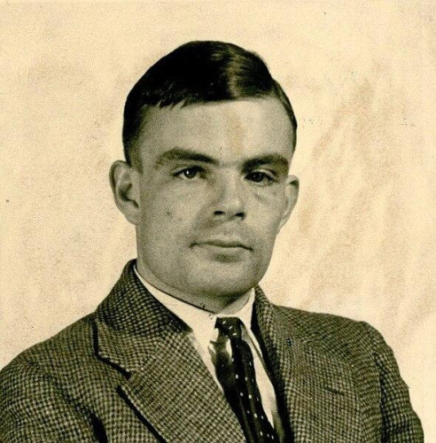 Alan Turing (1912-1954) in 1936 at Princeton University.

A monochrome image of a well-dressed gentleman wearing a suit, exuding elegance and sophistication.