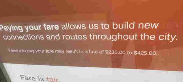 Toronto transit commission ad: paying your fare allows us to build new connections and routes throughout the city. Failure to pay may result in a fine of $235 to $425
