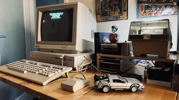 C128Dcr system with CMD FD-2000, HD and 1351 mouse, with a large Delorean toy in the foreground. 