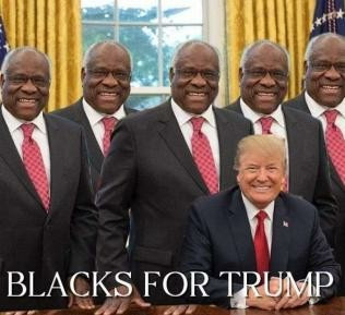 Color photograph. 
Smiling convicted felon Trump sits behind the Resolute desk in the Oval Office with hands together. Behind him stand 5 copies of corrupt SCOTUS Justice Clarence Thomas.