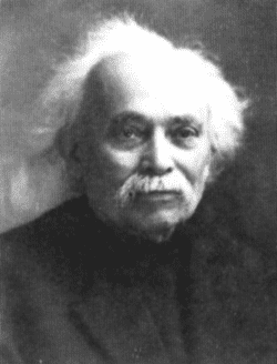 Black and white portrait of Jean Grave, facing straight ahead, with wispy gray hair and mustache. By Nadar - Own work, Public Domain, https://commons.wikimedia.org/w/index.php?curid=4649169