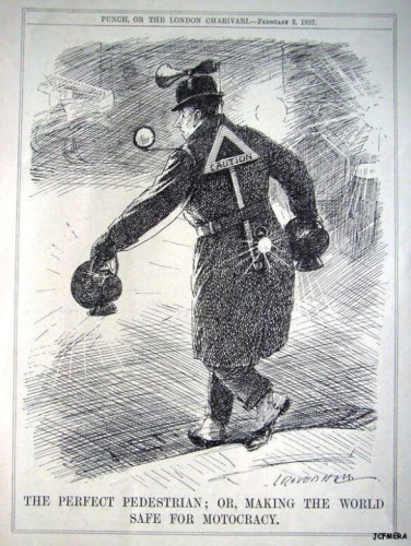 The Perfect Pedestrian; or, making the world safe for motocracy — Punch 1927

Image: B/W cartoon of man walking and carrying two lanterns with a mirror attached to his shoulder, a horn on his hat, and a safety triangle on his back, while cars drive past him.