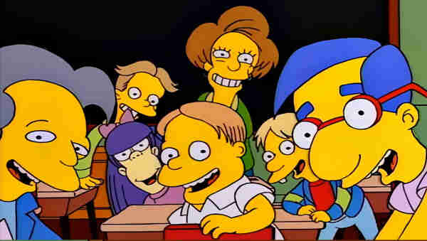 A screenshot from The Simpsons.

Bart's POV: his classmates and teacher all stare at him, eager for him to say a familiar line. (The screenshot itself isn't subtitled, but Milhouse may be saying "Say the line, Bart" at this point in the episode.)