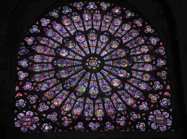 A large, stained glass, rose window. 