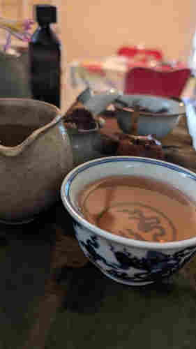 Tea in a dragon bowl.