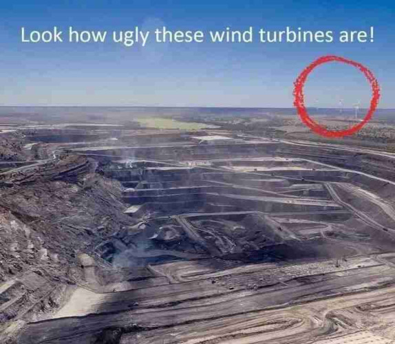 Photo of a mine with wind turbines in the background with a caption that reads "Look how ugly these wind turbines are!"