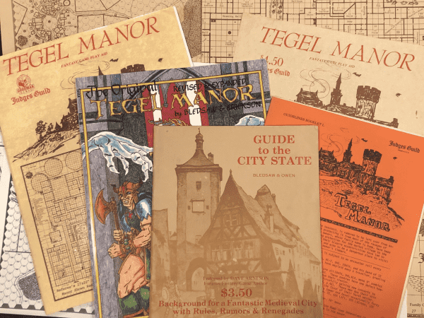 Different editions of Tegel Manor and Guide to the city state.