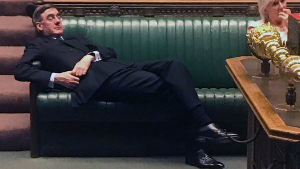 Jacob Rees-Mogg lying down on the green frontbench in the House of Commons