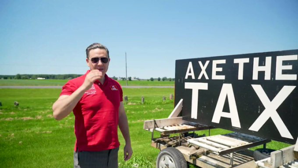 Poilievre wearing a red shirt with his name on it, standing beside a homemade ''axe the tax sign propped up in a farmers field 
Snippets from his speeches and roadside stumping:
Today, Canada is broken.
Justin Trudeau & immigrants broke it.
Vote for me & I will restore Canada to the country you remember & love
Vote for me & I will fix your future.

Don't forget to post an Axe the Tax sign in car windows & front lawns.
"Its absolutely unprecedented for a Leader of the Opposition to turn #CanadaDay into a partisan horse to flog.  Unbelievable to see our national holiday used as a cheap prop in Poilievre's greasy pre-writ campaign." - James Parsons @dred_tory