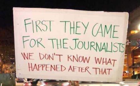 Sign: 'First hey came for the journalists - we don't know what happened after that'