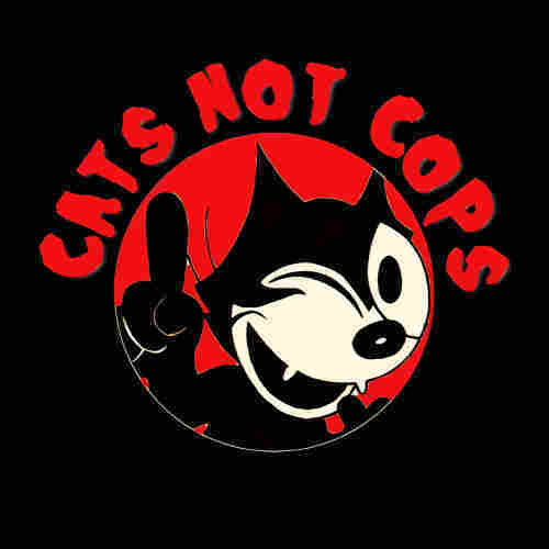 "Cats not cops" (EN: English)