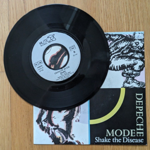 Photo of a 7" inch vinyl single. Depeche Mode, Shake the Disease.