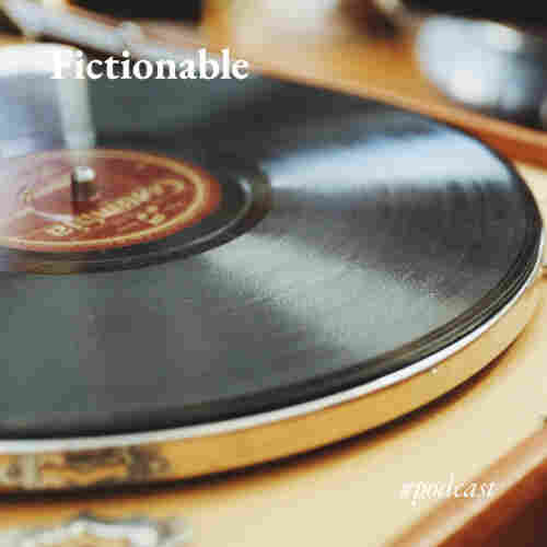 A close-up of an old record on a turntable, with the legend 'Fictionable #podcast'