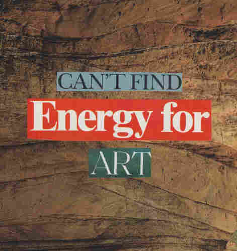 the large text "can't find energy for art" against a brown rock
