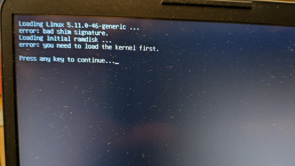 A laptop screen showing a kernel message error.