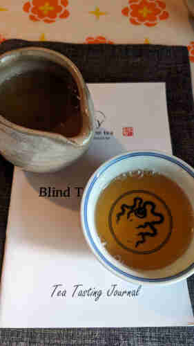 Mystery tea in a dragon bowl.