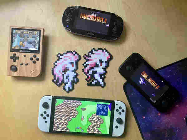 Perler Terra’s from FFVI surrounded by various consoles showing the game FFVI switch in the bottom, a handheld emulator on each side and a vita on top