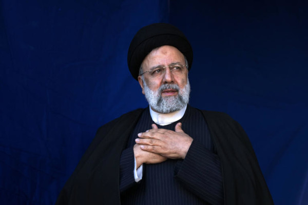 FILE- Iranian President Ebrahim Raisi places his hands on his heart as a gesture of respect to the crowd during the funeral ceremony of the victims of Wednesday's bomb explosion in the city of Kerman about 510 miles (820 kms) southeast of the capital Tehran, Iran, Jan. 5, 2024. A helicopter carrying Iranian President Ebrahim Raisi suffered a “hard landing” on Sunday, May 19, 2024, Iranian state television reported, without immediately elaborating. (AP Photo/Vahid Salemi, File)
© Provided by The Associated Press