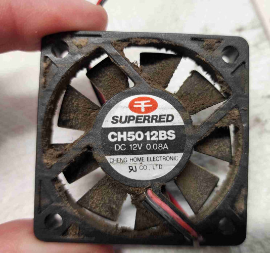 A Superred CH5012BS fan. It's choked with dust and grime 