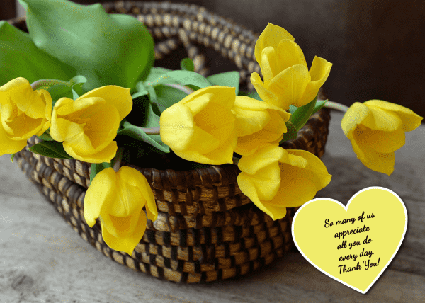 Basket of yellow tulips with a message of appreciation.