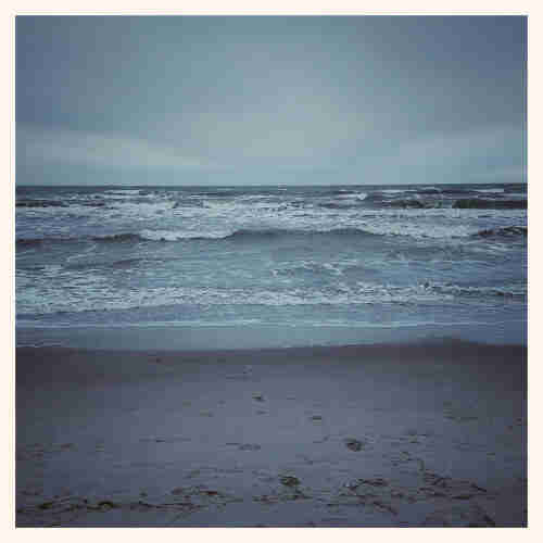 A wild Baltic Sea, waves under grey clouds.