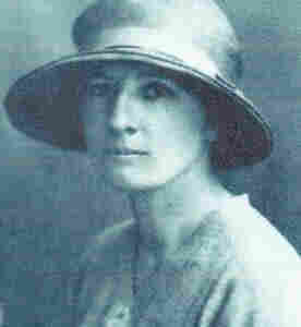 Composer Ina Boyle, photograph in a hat. 