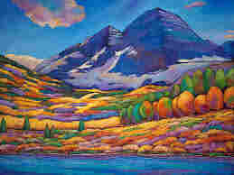 Rather creative colourful painting of a landscape with a bright blue river in the foreground, with soil covered with orange, yellow, green and purple grass behind it. On the left are many orange and green bushes, with some touches of purple and blue to them. On the horizon are high blue and purple coloured mountains, with some snow on them, The sky is deep blue with some clouds with a lot of pink and purple on them. 